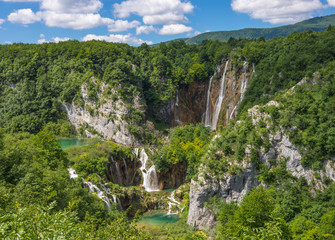 Landscape with cascading waterfalls.