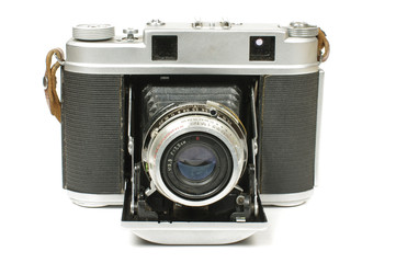 Old bellows camera isolated on the white background