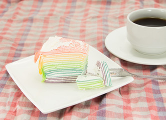 Rainbow layer cake and coffee