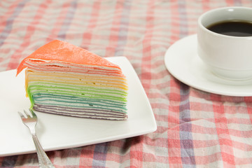 Rainbow layer cake and coffee