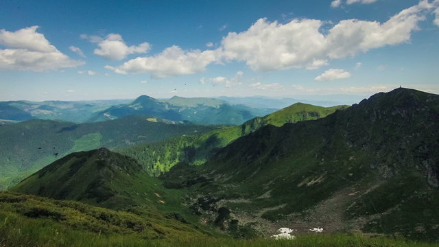 Timelapsed scenery with mountain peaks and cloudy sky Ukraine