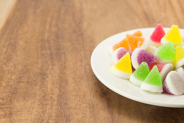 colorful jelly candies on wood