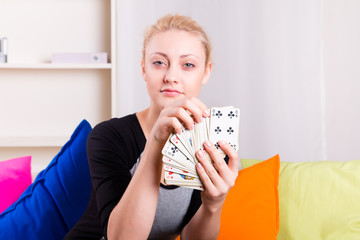 Woman select a card from the deck