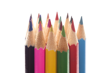 Stack of multicolored pensils close up isolated on white background