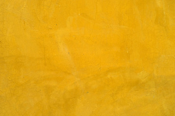 Real concrete with yellow white clolored hand paint mixed textur