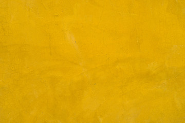Real concrete with yellow white clolored hand paint mixed textur