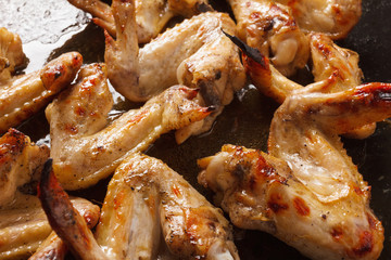 Preparation for the barbecue - chicken wings. Ready meal