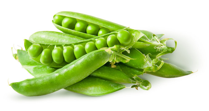 Pile green peas in pods