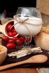 corn flake and milk with fresh cherry tomatoes.
