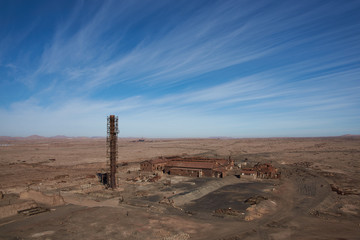 Derelict and rusting industrial buildings at the historic Humberstone Saltpeter Works in the...
