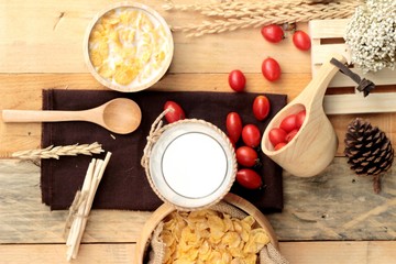 corn flake and milk with fresh cherry tomatoes.