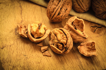 walnuts on rustic old wooden table