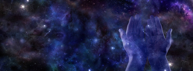 Cosmic healing banner - Pair of open flat transparent blue hands on a wide deep dark blue space background with a copy space on right side