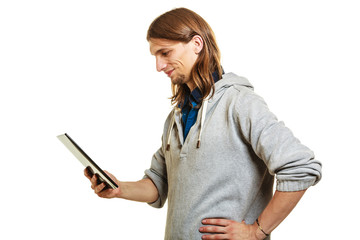Fototapeta premium Fashion man using pc tablet browsing internet.