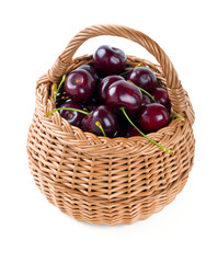 cherries in basket isolated on white