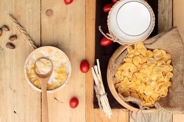 corn flake and milk with fresh cherry tomatoes.