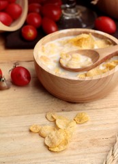 corn flake and milk with fresh cherry tomatoes.