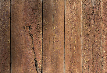 Old wooden planks with remnants of paint. Backgrounds and textur