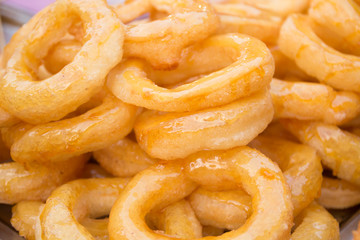 closeup of a pile of  typical  donuts