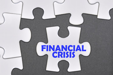 jigsaw puzzle written word financial crisis