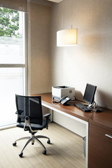 Simply office table with desktop and printer