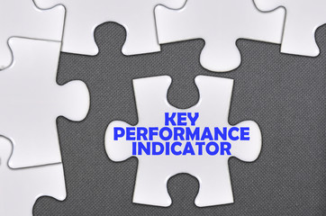 jigsaw puzzle written word Key Performance Indicator