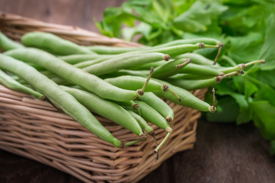 Green beans in wicker basket