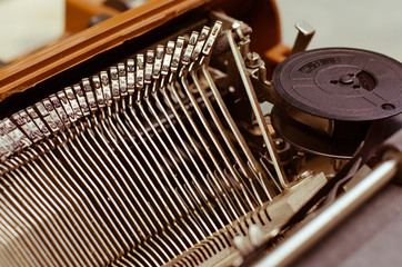Old English Typewriter In Vintage Tone.