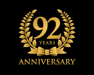 anniversary logo ribbon wreath black background 92