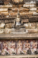 Ancient Buddha Statue at Sukhothai historical park, Mahathat Temple ,Thailand.