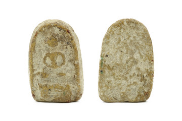 small buddha image used as amulets on white background