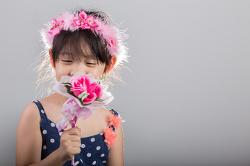 Young Girl Holding Flowers Background / Kid with Flowers Background