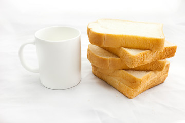 Fototapeta na wymiar Empty coffee cup or coffee mug and sliced bread isolated on whit