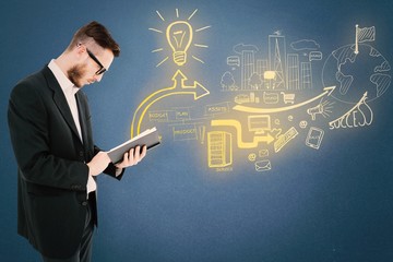 Composite image of geeky young man reading from black book