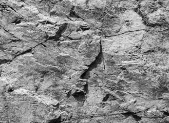 Fotobehang Steen Rough gray rock wall, stone texture