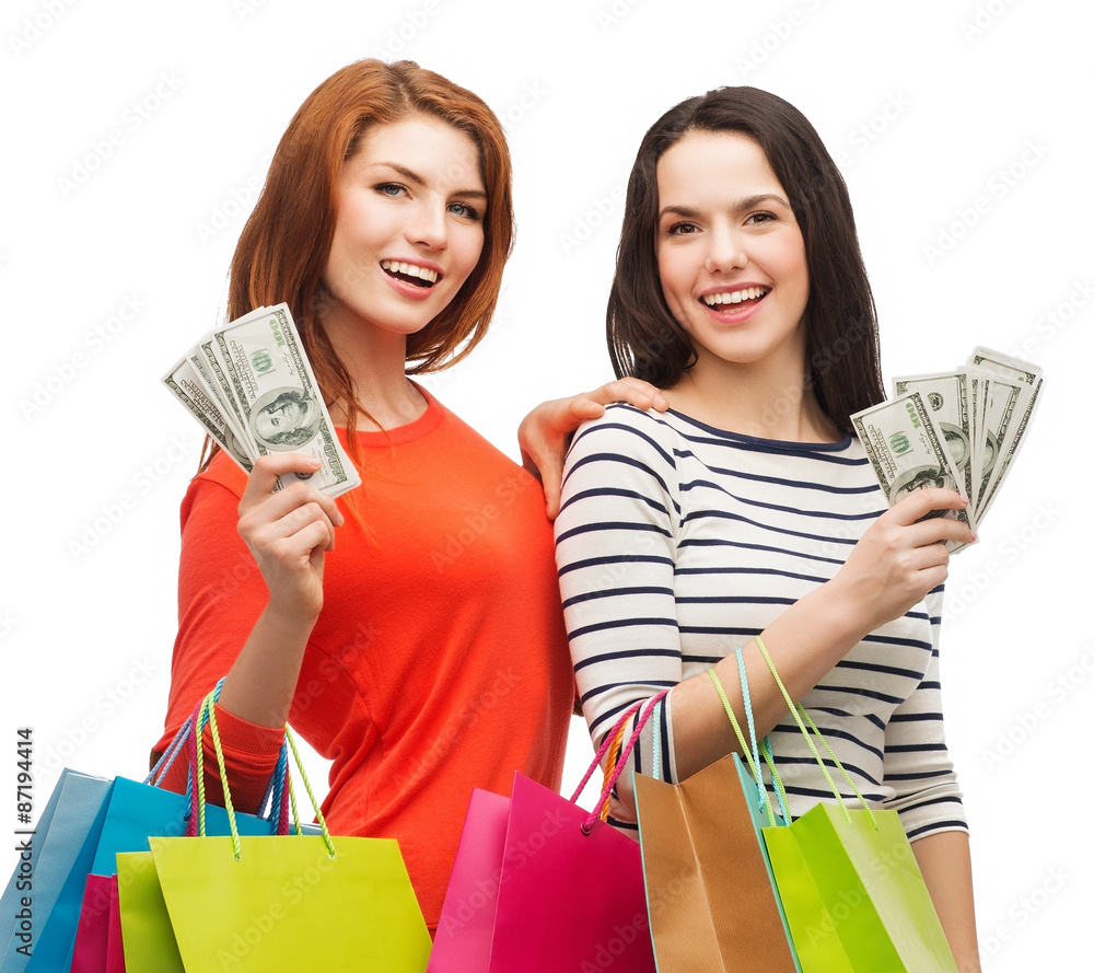 Poster smiling teenage girls with shopping bags and money