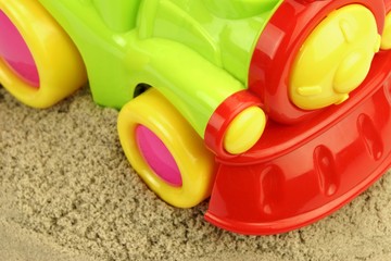 Close-up Of Toy Truck With Sand Heap