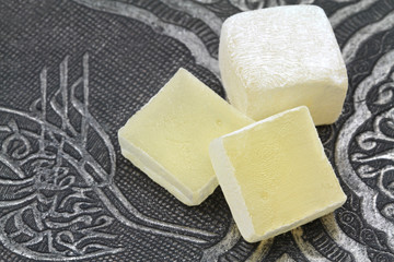 Turkish delight with Ottoman Sultans Tugra carved patterned on a metal plate