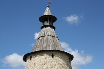 Fototapeta na wymiar Stone tower of old fortress. Kremlin of Pskov, Russia