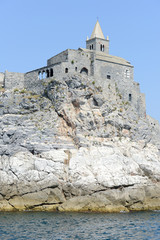 Old church on a rocky coastal outcrop at Portovenere, Italy