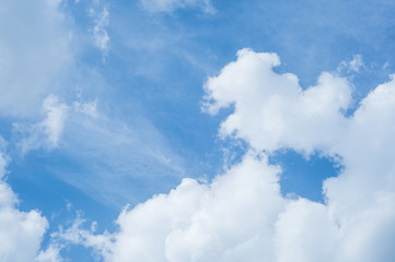 White fluffy clouds in the blue sky