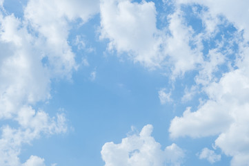 White fluffy clouds in the blue sky
