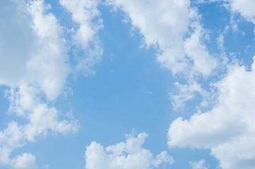 White fluffy clouds in the blue sky