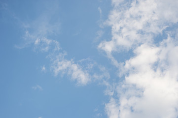 White fluffy clouds in the blue sky