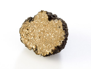 Sliced summer truffle on a white background