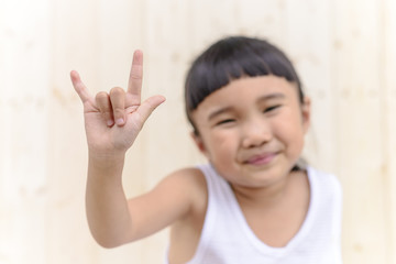 Kid with hand posture