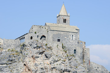 Old church on a rocky coastal outcrop at Portovenere, Italy