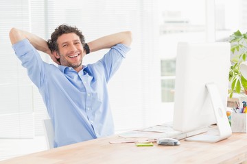  Casual businessman using computer in office