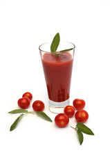 Glass of tomato juice and cherry tomatoes