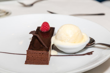 Raspberry on Chocolate Cake with Vanilla Ice Cream